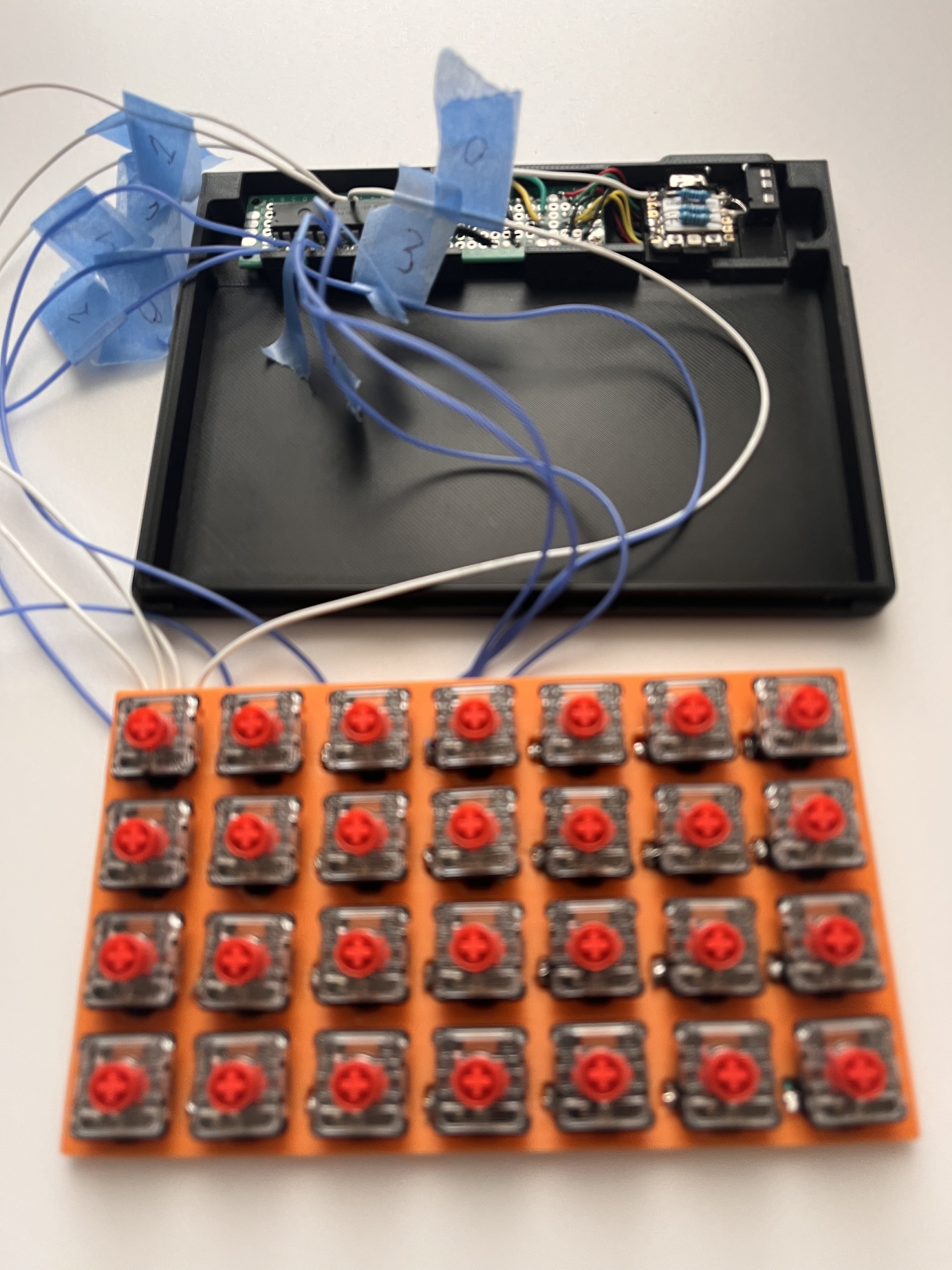Testing key input with temporary wiring connected to the microcontroller and MCP23017